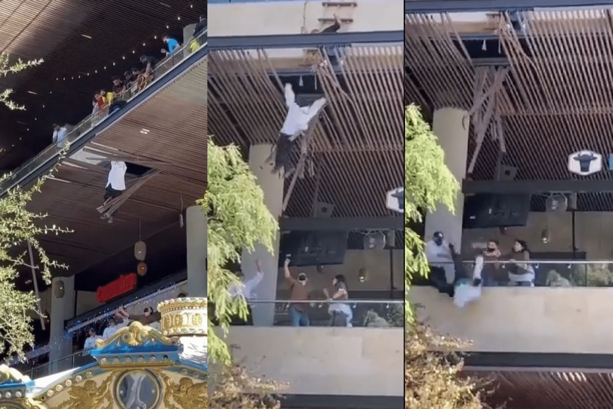 Foto: Captura de video | Un hombre cayó desde varios metros de altura luego de quedar atrapado en una pérgola de madera de un centro comercial