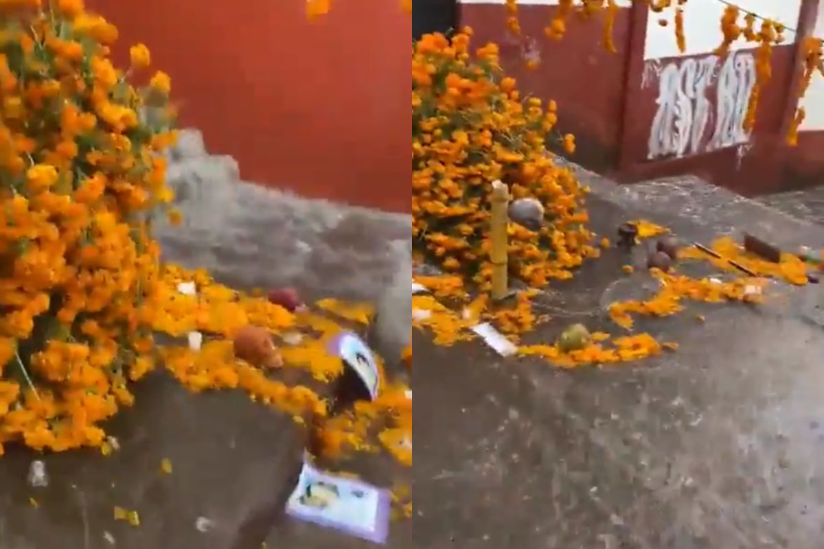 Foto:Captura de pantalla|VIDEO: Lluvia destroza el altar de Día de Muertos más grande de Michoacán